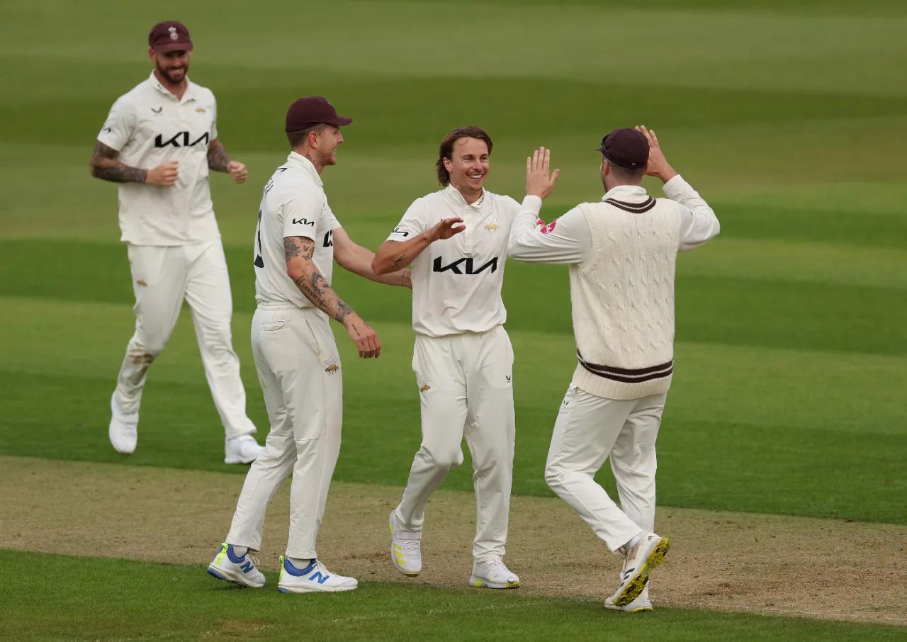 Worrall and Burns lead Surrey to victory over Ackermann's gritty effort